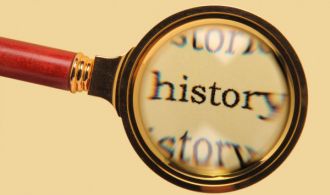 depositphotos_2478371-stock-photo-old-magnifying-glass-on-word